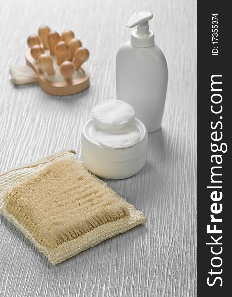 Set of bathing articles on gray background