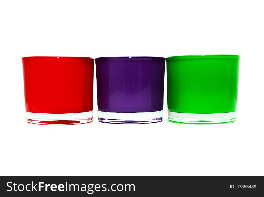 Three coloured cups in white