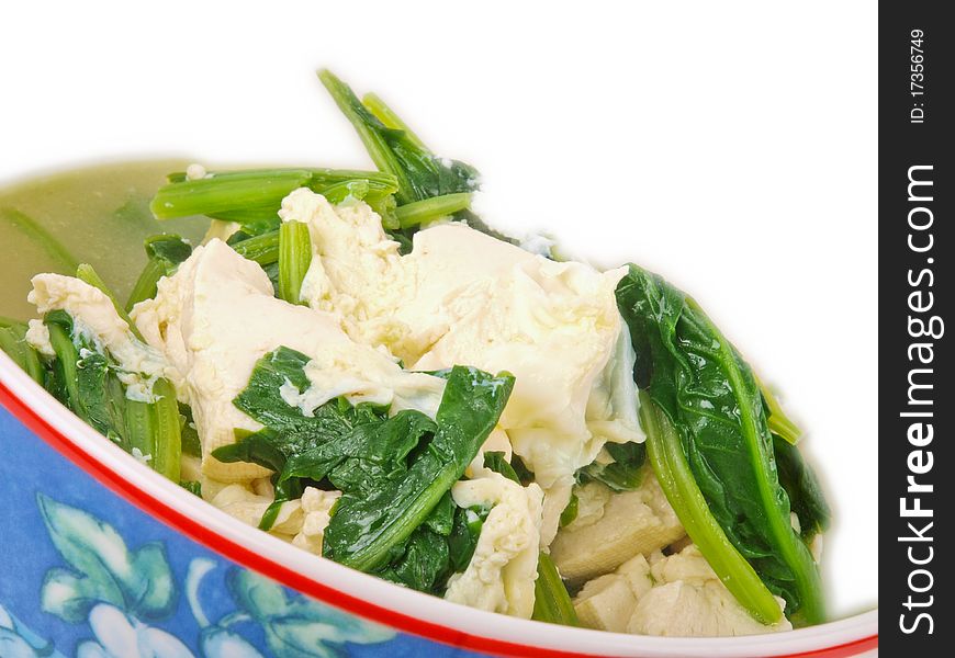 Tofu soup, close up, on white background