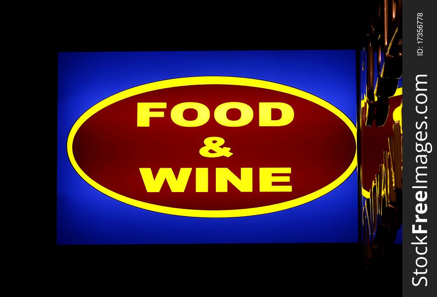 Food and wine neon sign at night. Food and wine neon sign at night