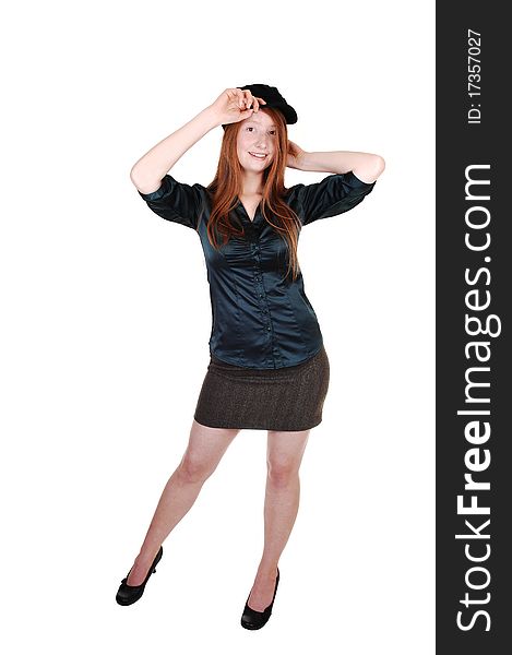 A young pretty woman with long red hair in a green blouse wearing a hat with buttons on, for white background. A young pretty woman with long red hair in a green blouse wearing a hat with buttons on, for white background.