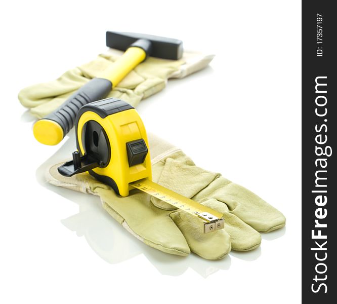 Gloves with measuring tape and hammer