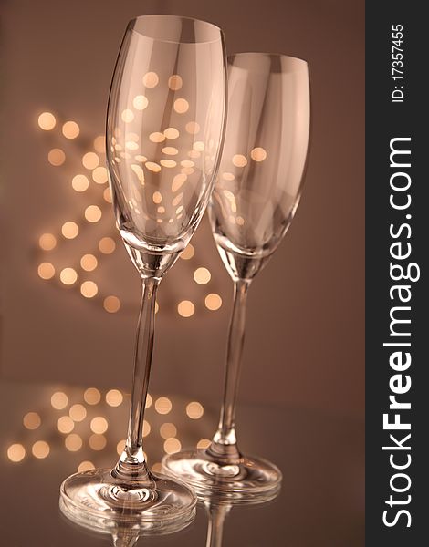 Glass of champagne on holiday background. Glass of champagne on holiday background
