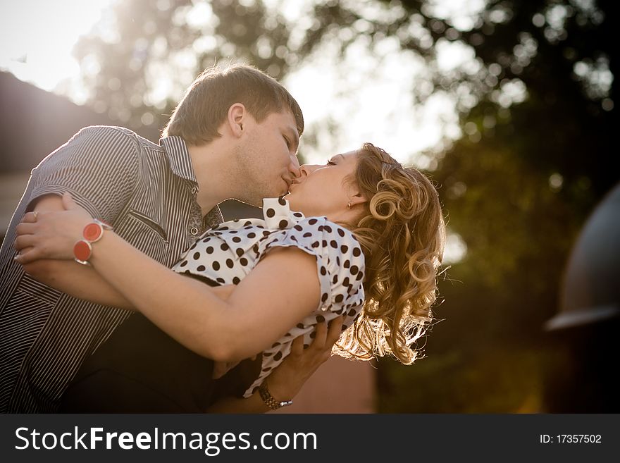 Exciting kiss of a young beautiful couple. Exciting kiss of a young beautiful couple