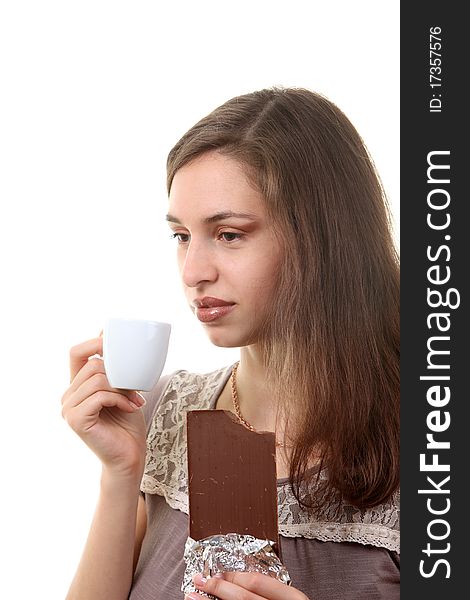 Woman drink coffee with a chocolate