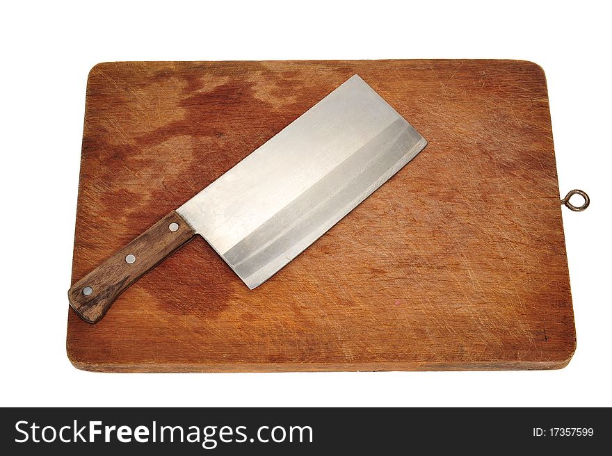 Kitchen Cleaver On A Wooden Chopping Board. Kitchen Cleaver On A Wooden Chopping Board