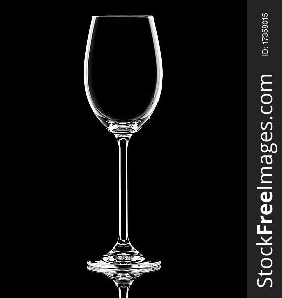 Wineglass on isolated on black background. Wineglass on isolated on black background