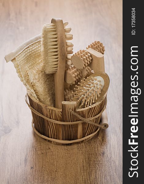 Wooden bucket for bathing on wooden background