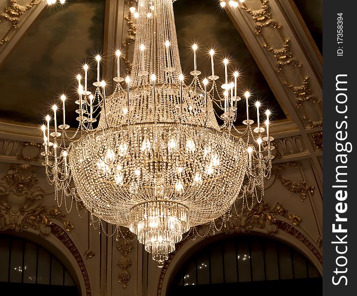 A vintage crystal lamp inside theater