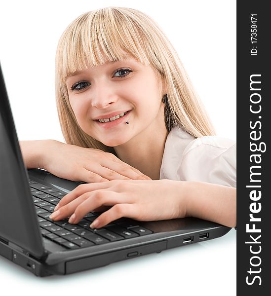 Smiling young girl with laptop