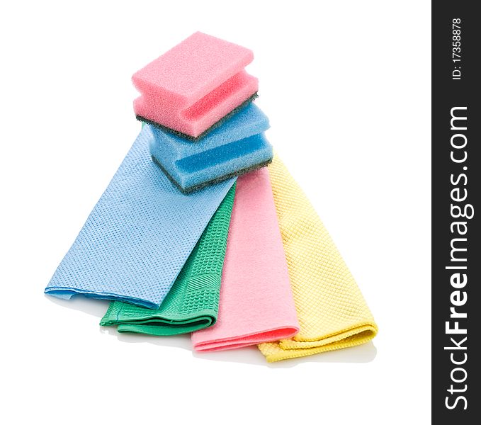 Stack of colored cleaning rags and sponges isolated