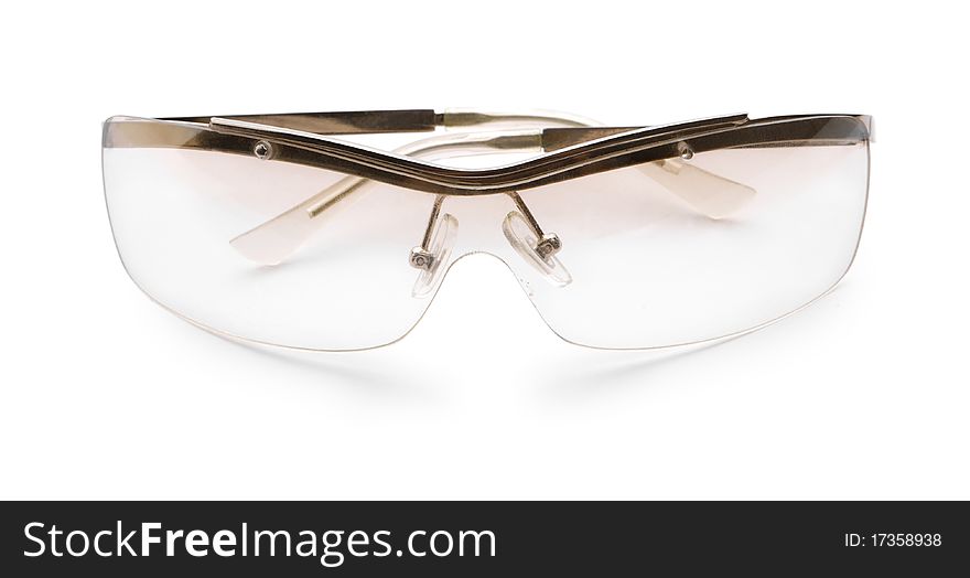 Transparent brown glases isolated on a white background