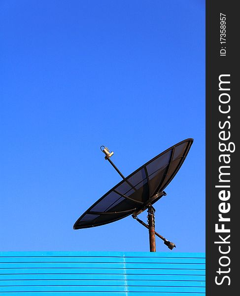 Satellite TV with a bright sky