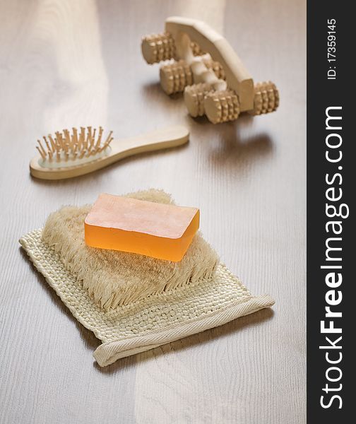 Set of articles for bath
wooden hairbrush, massager
natural bast
orange hanmade soap
on wooden background. Set of articles for bath
wooden hairbrush, massager
natural bast
orange hanmade soap
on wooden background