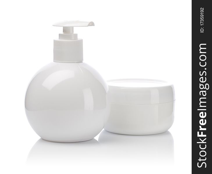 White plastical bottle with spray and jar with cream. White plastical bottle with spray and jar with cream