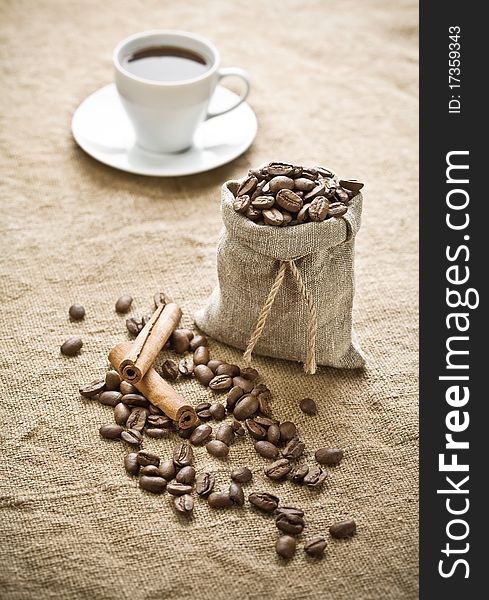 Composition of cinnamon and coffee on sacking
