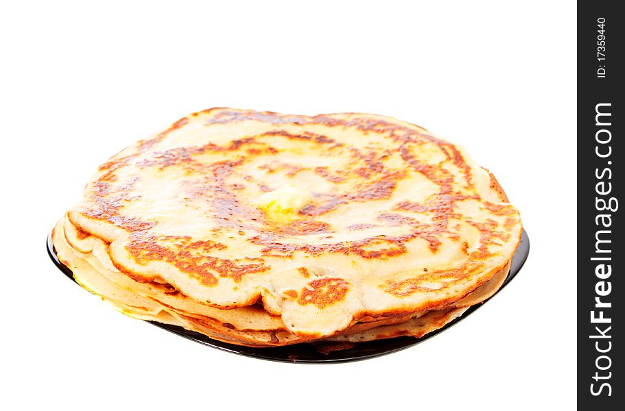 Fried pancakes on a plate, on a white background it is isolated. Fried pancakes on a plate, on a white background it is isolated.