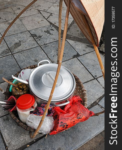 Food utensils in a basket at the streets of Hanoi in Vietnam