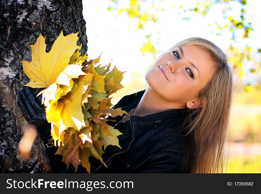 Young beautiful woman with the nature, autumn. Young beautiful woman with the nature, autumn.