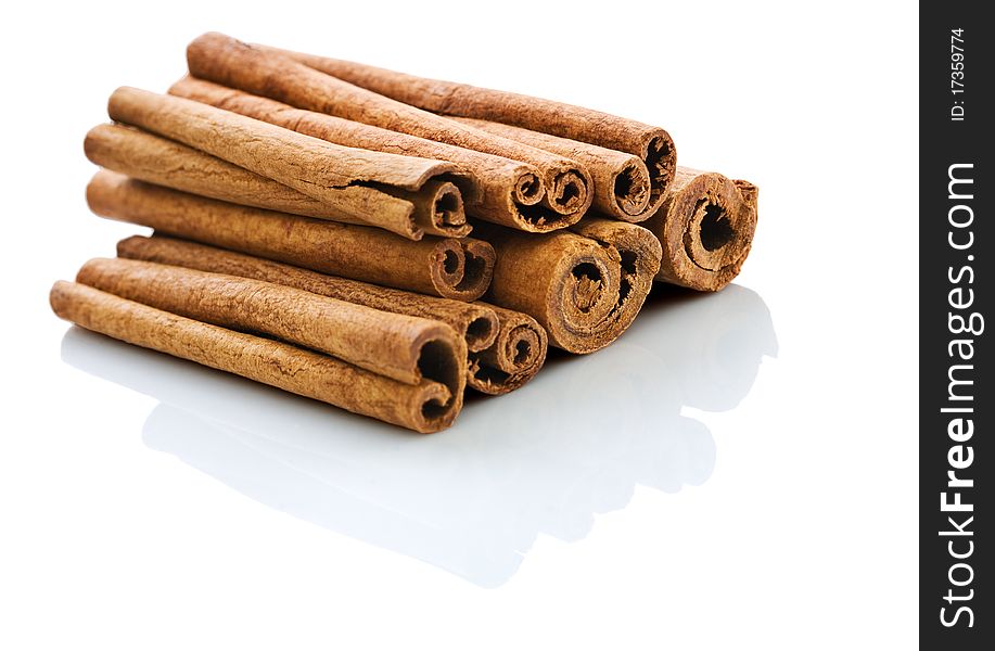 Stack of cinnamon isolated on white background