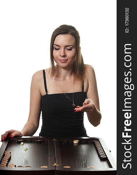 Young woman play a backgammon. Young woman play a backgammon