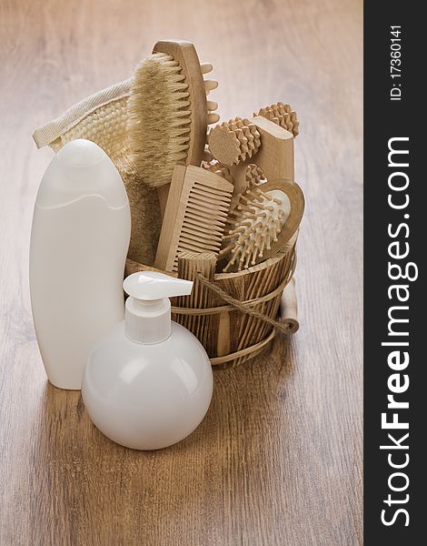 White bottles and wooden bucket