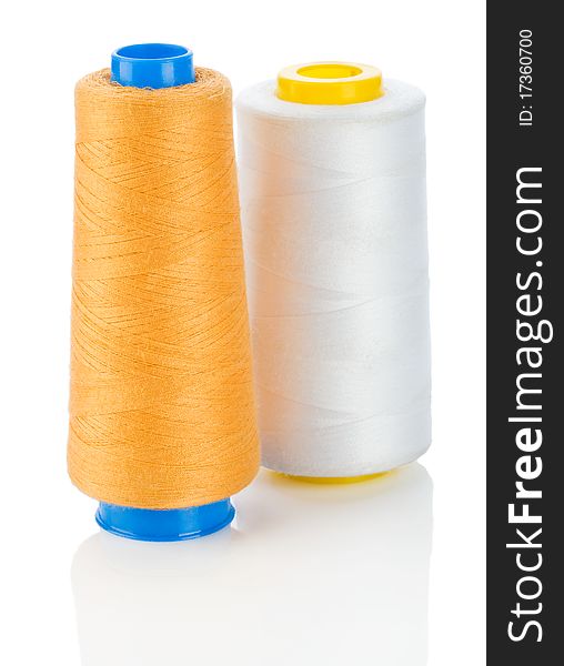 Orange And White Thread On Spools Isolated