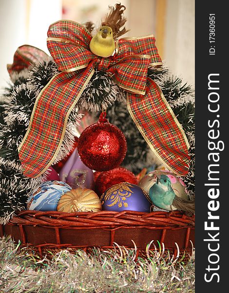 Two beautiful birds sitting on the Christmas basket. Two beautiful birds sitting on the Christmas basket