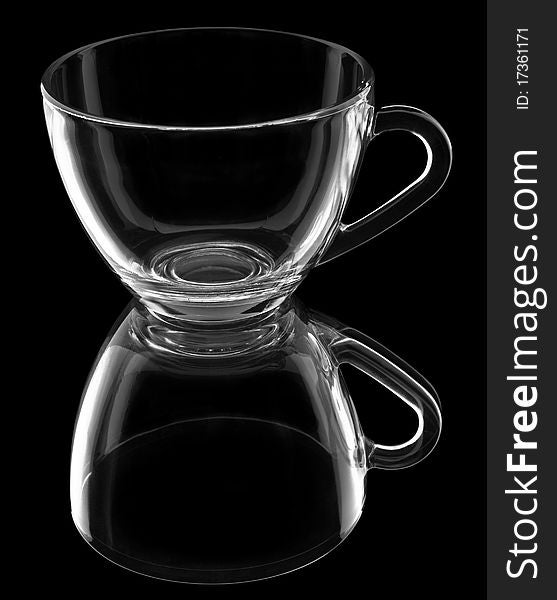 Transparent cup with reflection isolated on black background