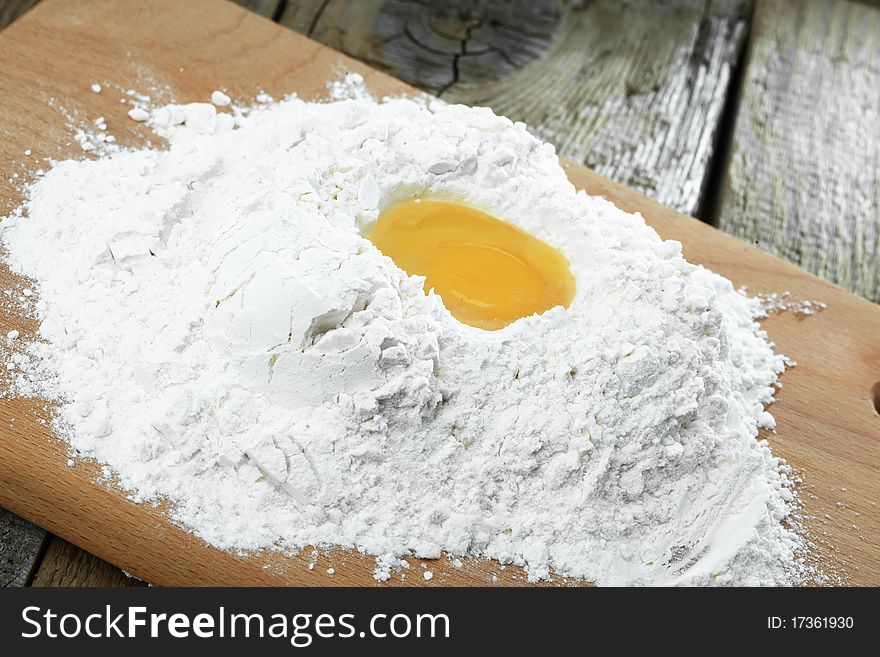 Preparation of dough from flour and eggs for sacking. Preparation of dough from flour and eggs for sacking