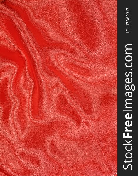 Background of texture of corrugated red satin