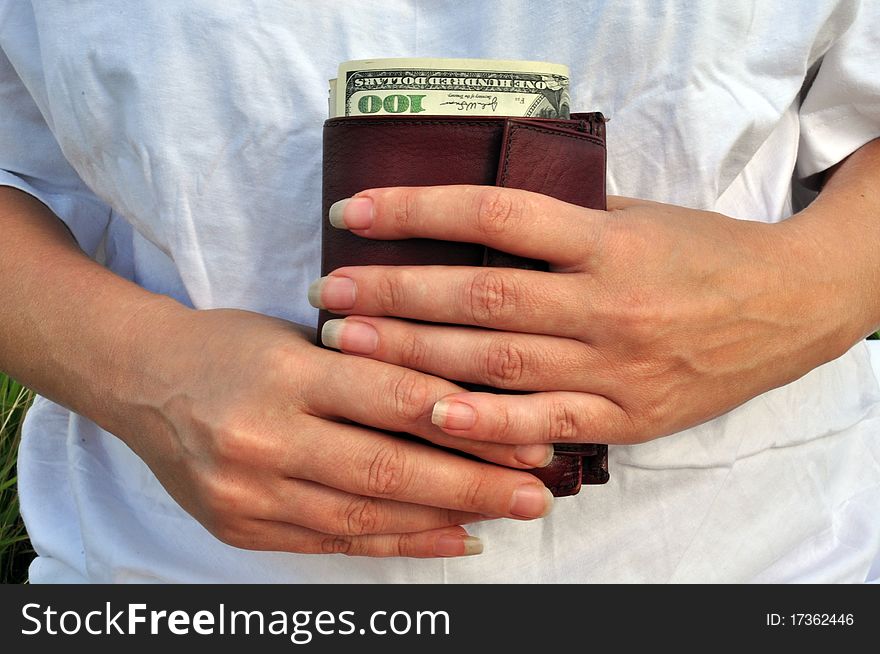 Women S Hands And Purse With Dollars