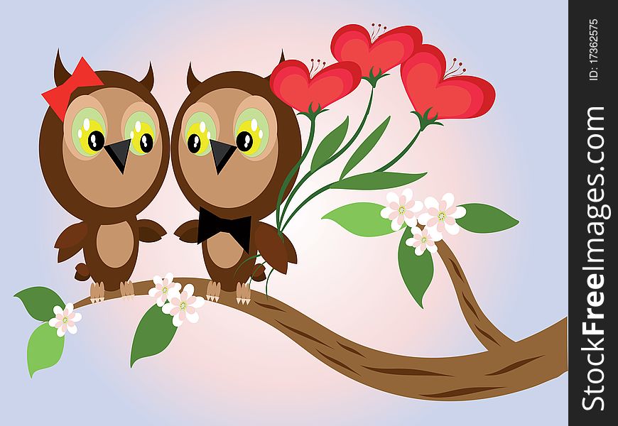 Couple of owls sitting at the branch of cherry. Couple of owls sitting at the branch of cherry