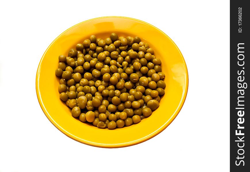 Canned green peas in a yellow plate