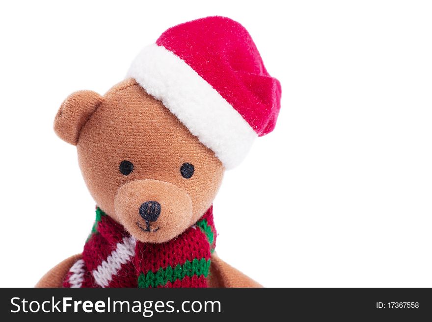 Teddy bear with santa`s hat isolated on the white