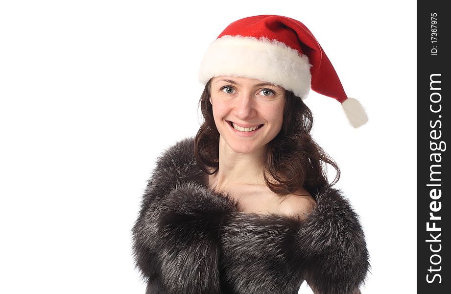 Portrait of a young beautiful smiling lady in Santa's hat isolated on white. Portrait of a young beautiful smiling lady in Santa's hat isolated on white