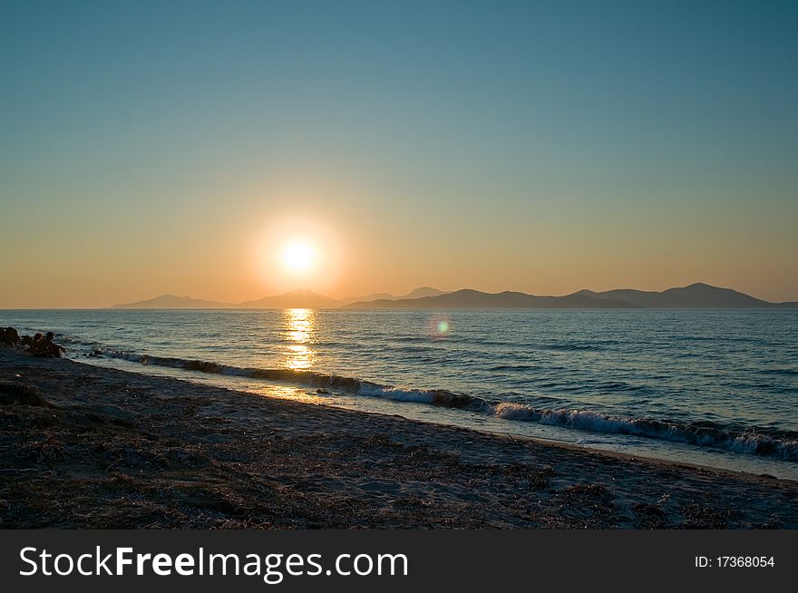 Sun setting over Kalymnos, island in the Aegean. Sun setting over Kalymnos, island in the Aegean.