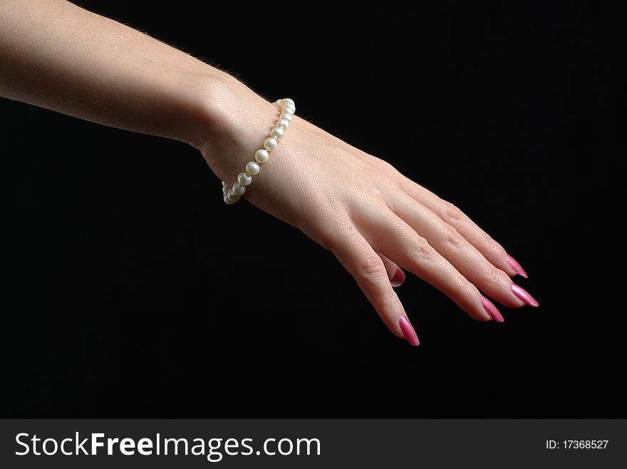 Hand with a pearl bracelet. Hand with a pearl bracelet