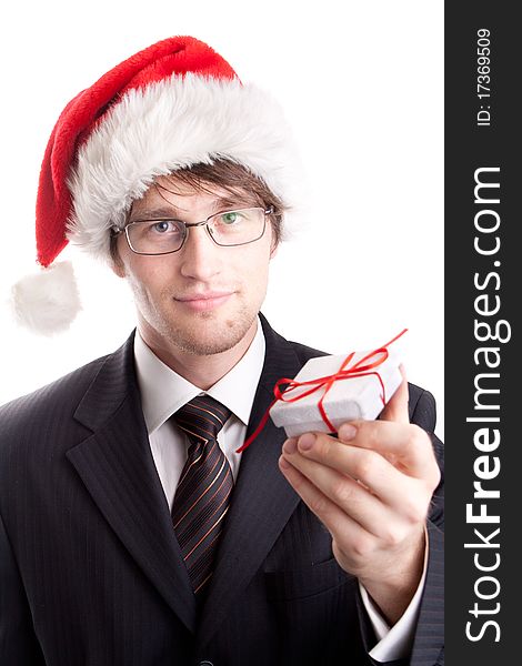 Handsome businessman offering a christmas gift