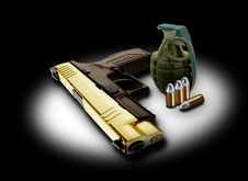 Handgun Bullets And Granade Royalty Free Stock Photos