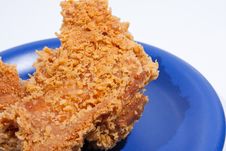 Fried Chicken Dish Dark Blue. Stock Photo