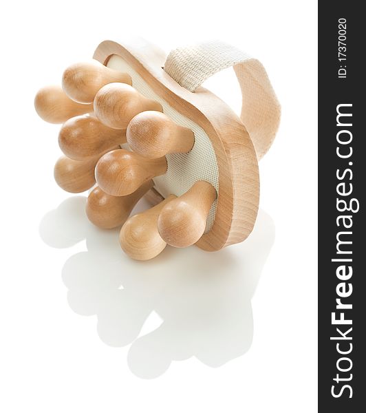 Studio shot single wooden massager on white background