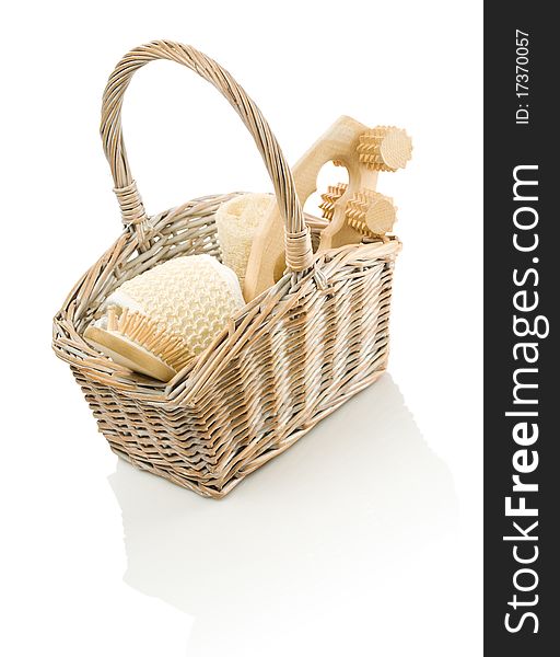 Studio shot objects for care in basket on white background