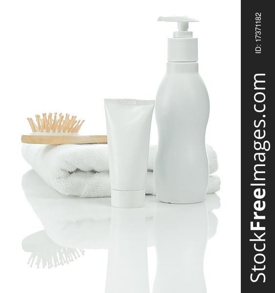 Tube bottle towel and hairbrush