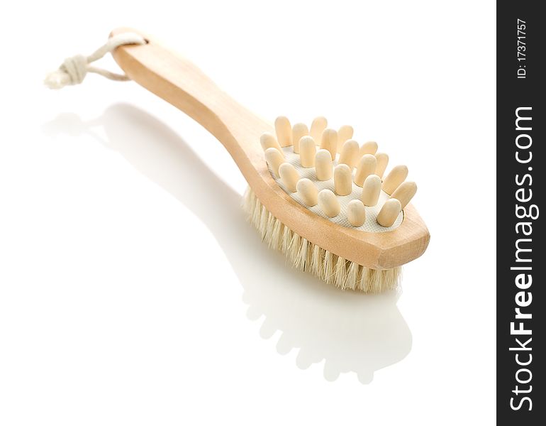 Studio shot wooden massager on white background