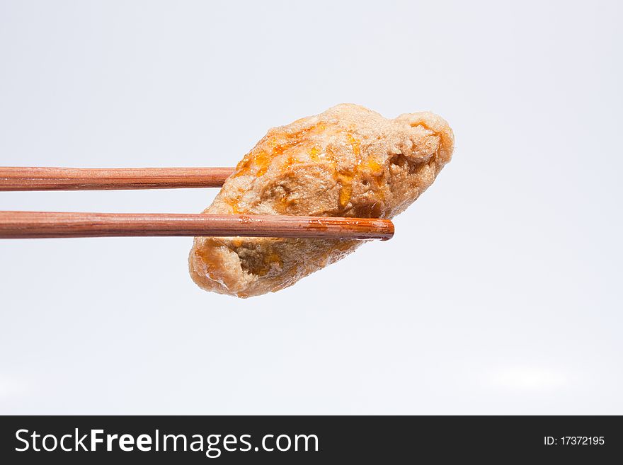 Fried Fish Balls With Chopsticks.