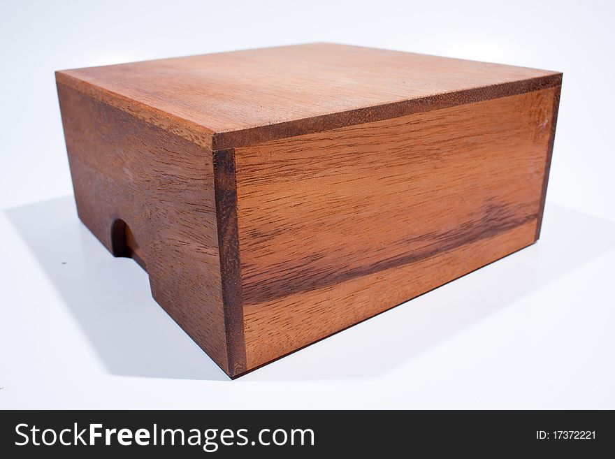 Colored square wooden box. On a white background.