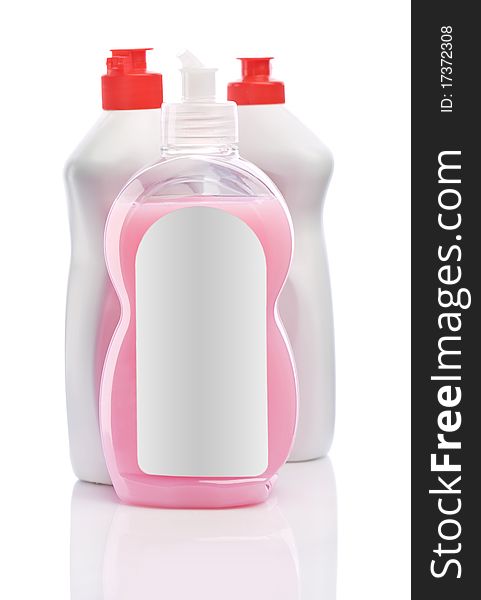 White Bottles With Red Lids And Pink Cream