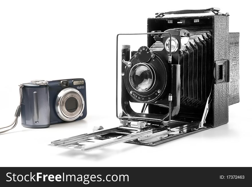 Old and modern camera isolated on white. Old and modern camera isolated on white