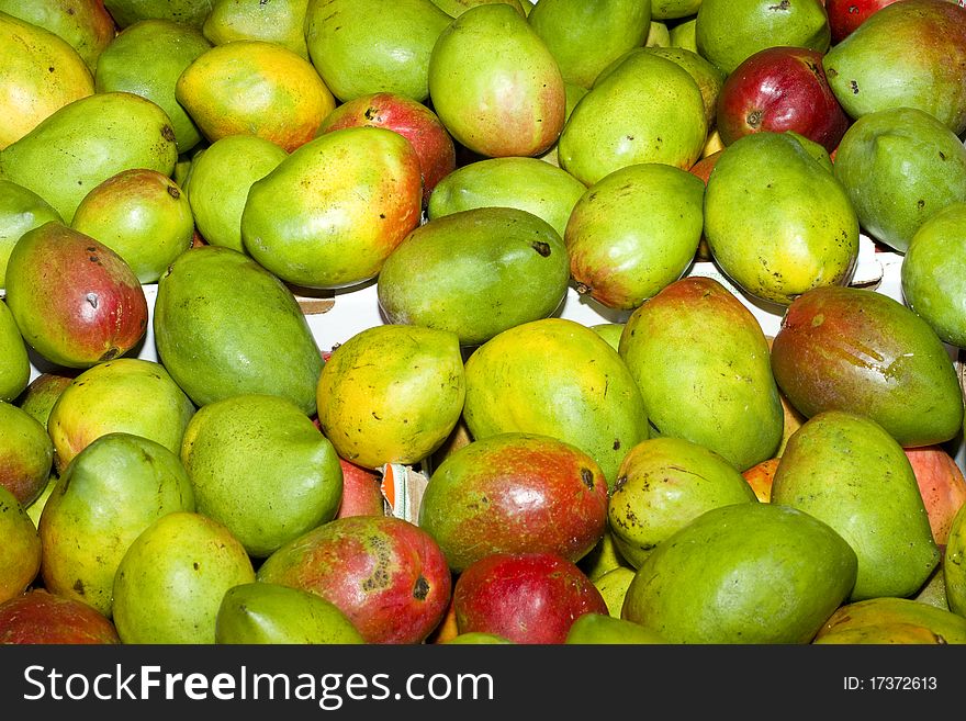 Green mangoes wholesale in a fruit market